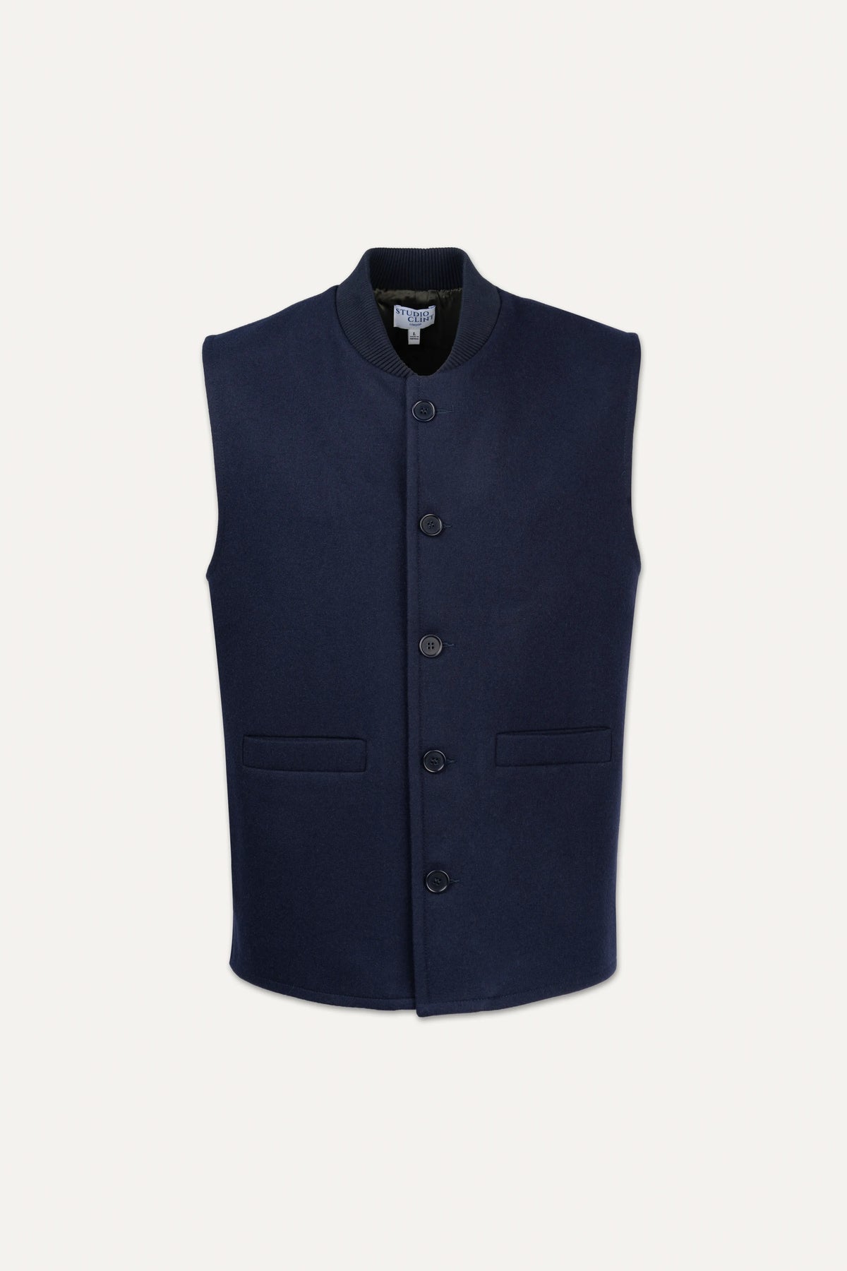 A sleeveless navy blue waistcoat with a mandarin collar, front button closure, and two front flap pockets, shown against a light off-white background.